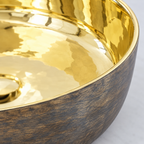 Close-up of the rim where the hammered brass interior meets the bronze exterior