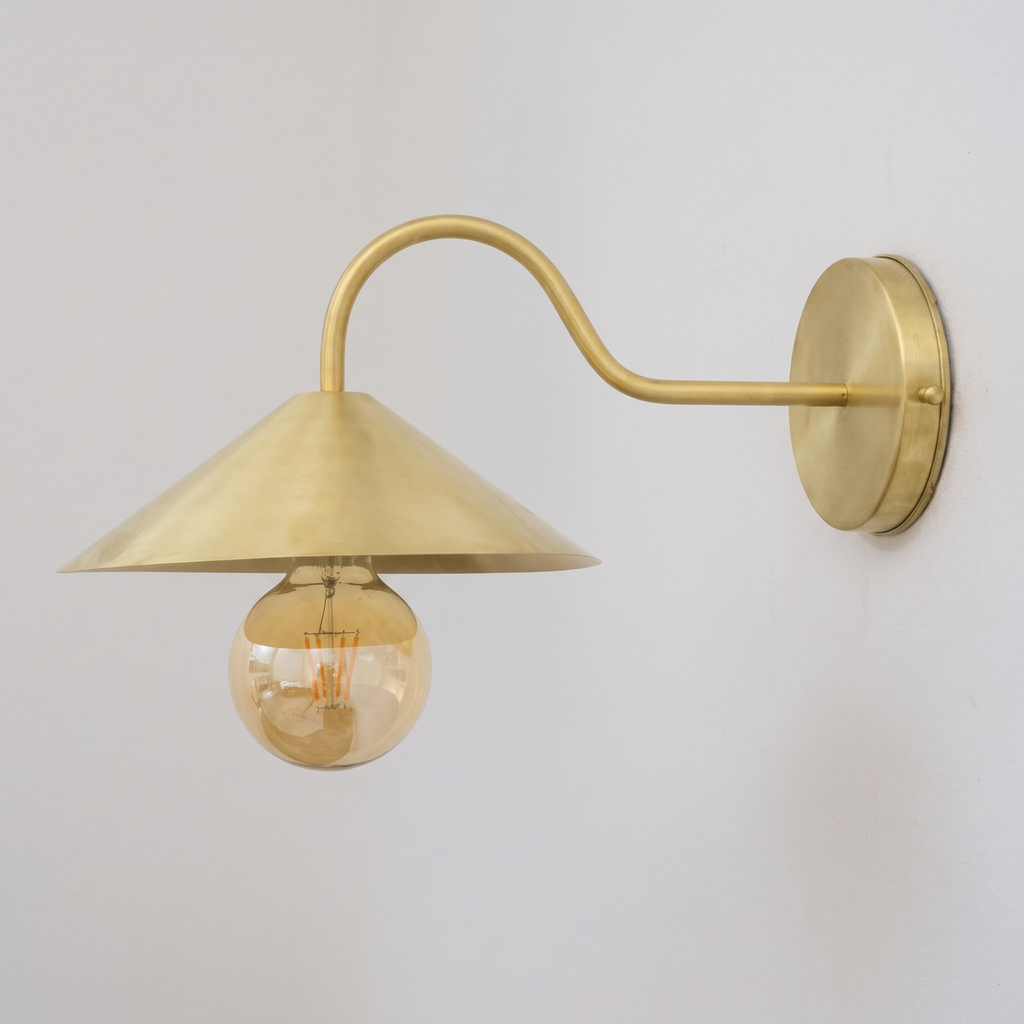 Brushed brass gooseneck wall sconce with cone shade, side view