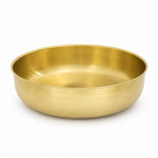 Brushed brass round vessel sink on a white background