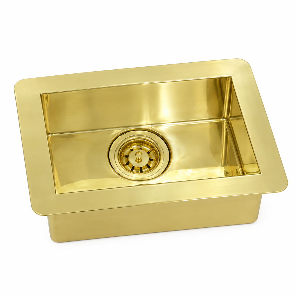 Compact rectangular brass undermount sink on a white background