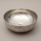 Round German silver vessel bowl with engraved vine pattern outside on a plain background