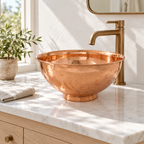 Hammered Copper Pedestal Bowl Vessel Sink installed in a bright bathroom