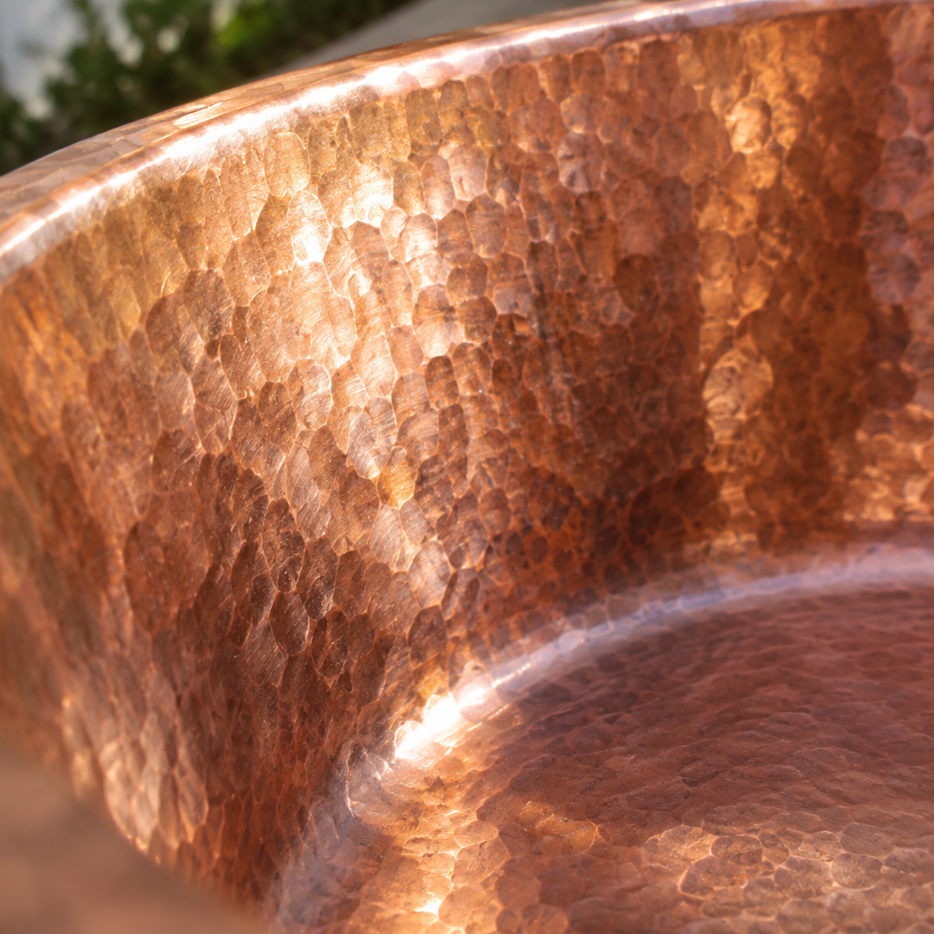 Hammered Copper Undermount Kitchen Sink, close-up detail of the hand-hammered texture