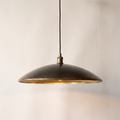 Hammered dark bronze saucer pendant light with brass interior