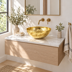Hammered Round Brass Vessel Sink in a bright, airy bathroom