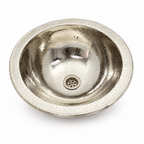 Hammered round German silver drop-in sink on a white background