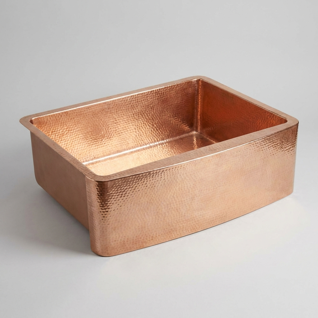 The Fes Farmhouse Sink, hand-hammered polished copper apron-front sink
