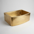 The Marrakech Farmhouse Sink, hand-hammered polished brass apron-front sink