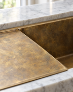 Detail of aged brass patina and flat rim