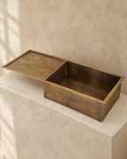Brass kitchen sink with drainboard, three quarter view
