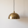Smooth aged brass dome pendant light