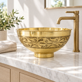 Vine Engraved Brass Bowl Vessel Sink installed in a bright bathroom